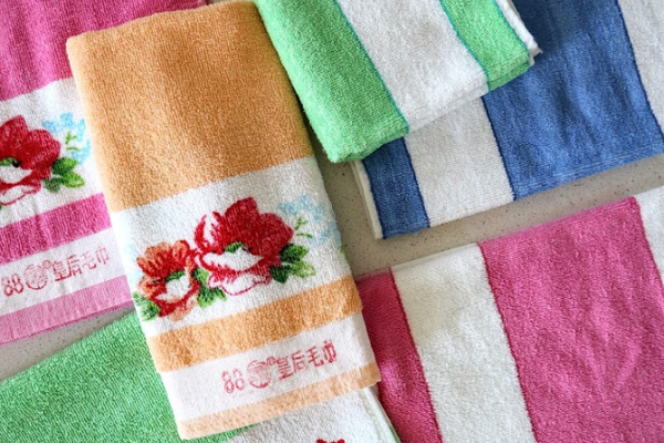Array of colorful striped and floral towels