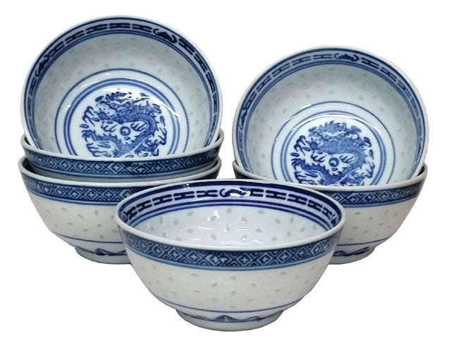 Six blue on white ling long ceramic bowls stacked on top of each other