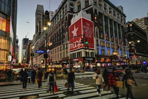 Busy New York City street in front of Macy's
