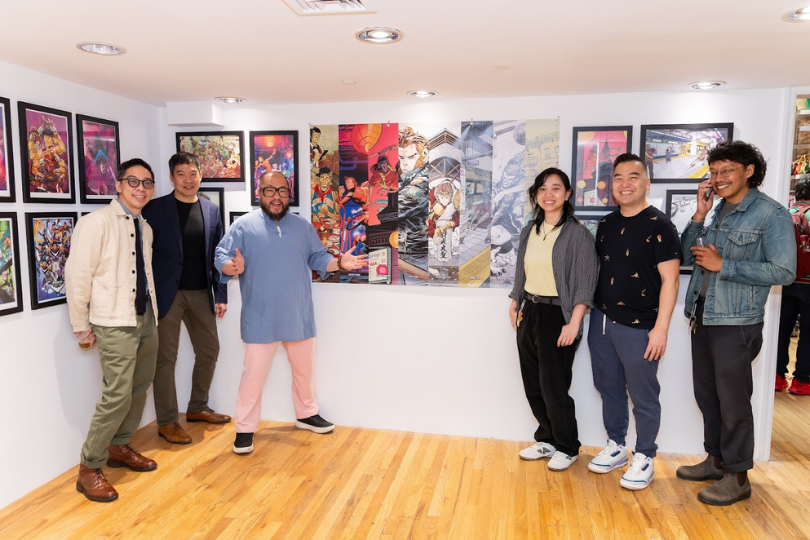 Six of the artists in the Monkey King exhibition Pearl River Mart's Soho gallery