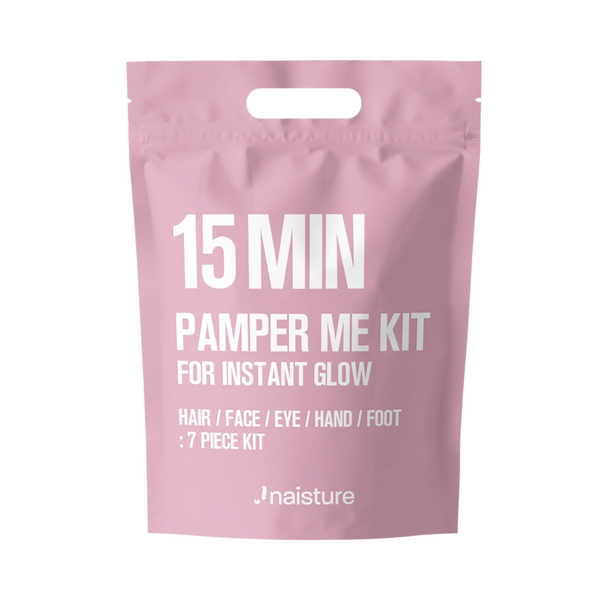 Pink '15 Min Pamper Me Kit' packaging with white text on a white background