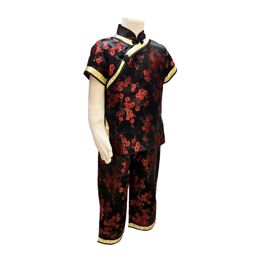 Traditional kids outfit in black with red blossoms on mannequin