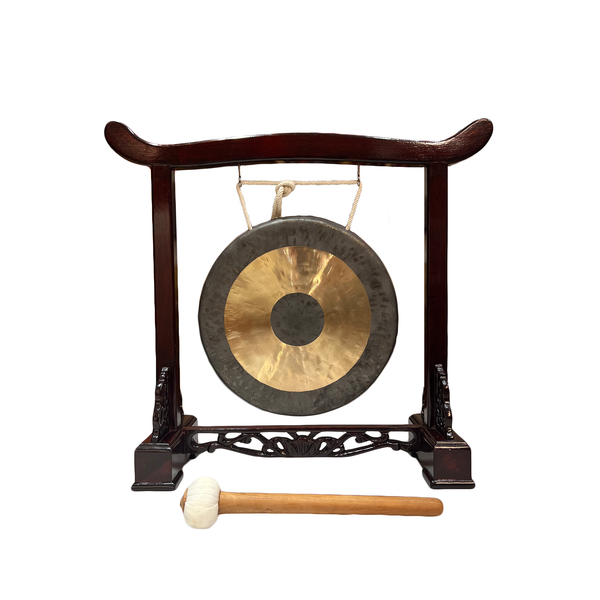 Gong on a stand with a mallet on a white background