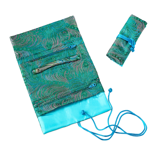 Teal drawstring bag with peacock feather pattern on a white background