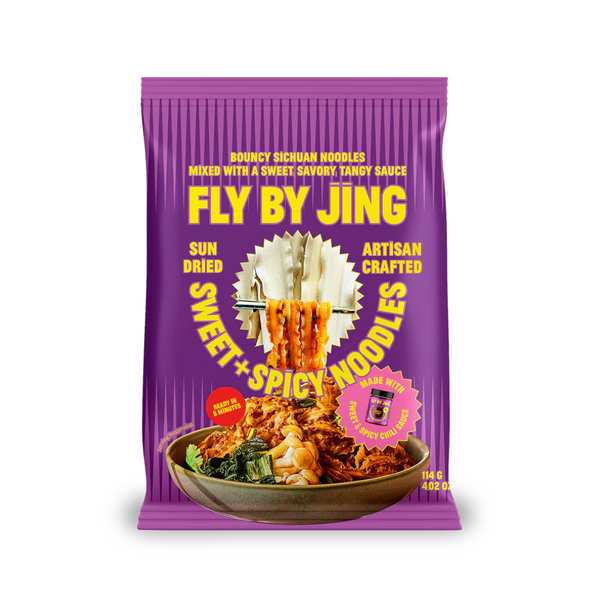 Purple package of Fly By Jing sweet and spicy noodles on a white background