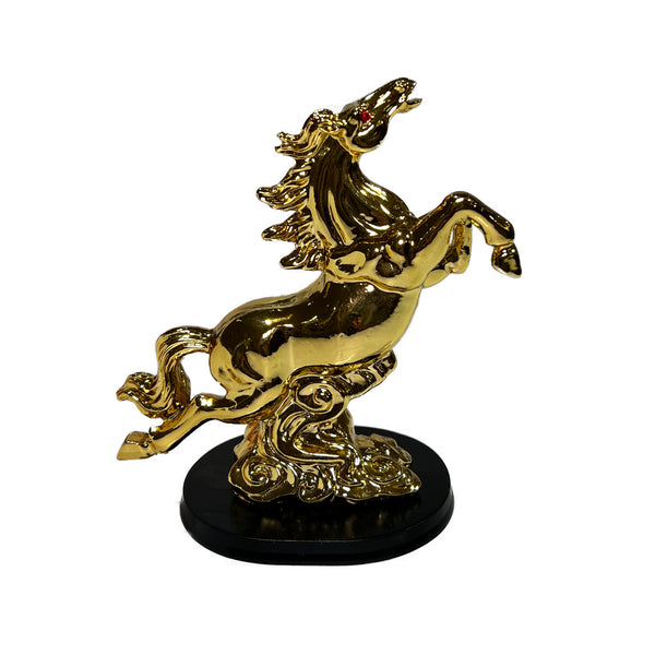 Gold figurine of horse jumping