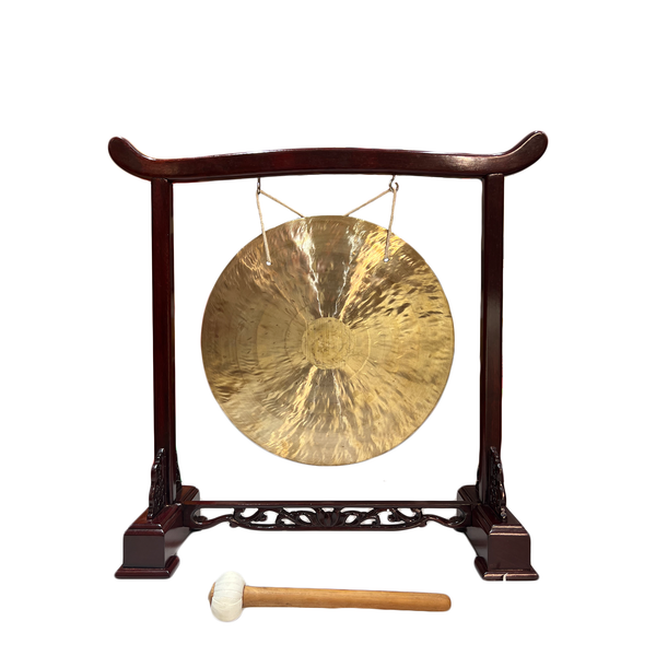 Gong on wooden stand with mallet