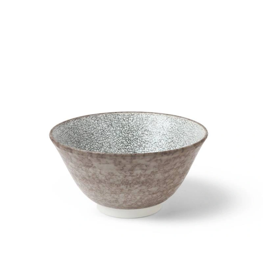 Ceramic bowl with textured surface on a white background