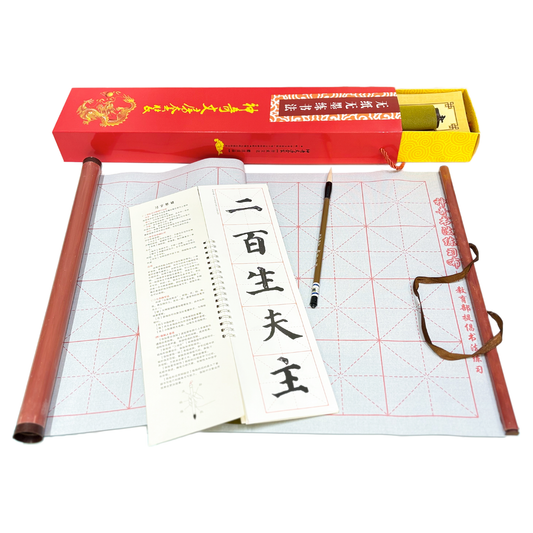 Calligraphy practice set with box, brush, and instructions