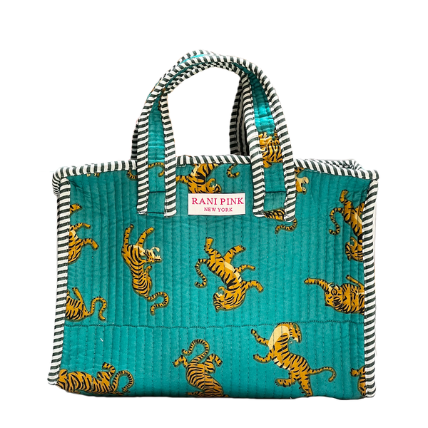 Teal quilted bag with tiger pattern and striped handles, featuring Rani Pink New York label.