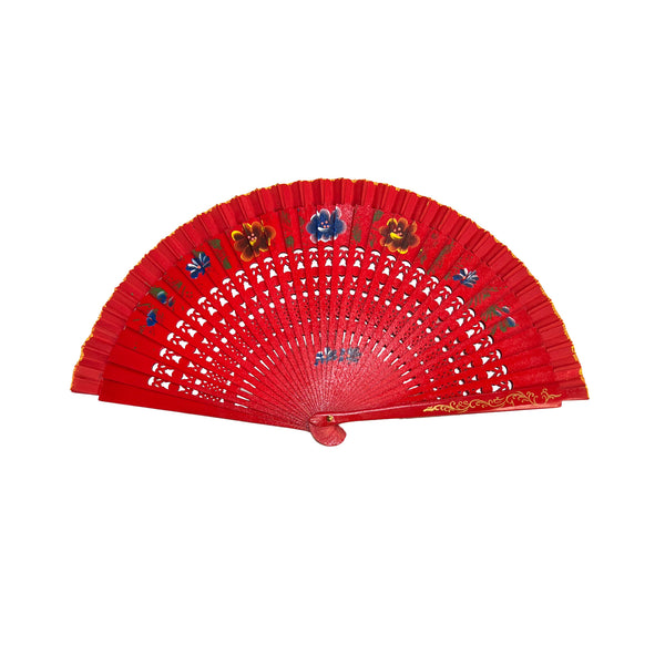Red hand fan with floral designs on a white background