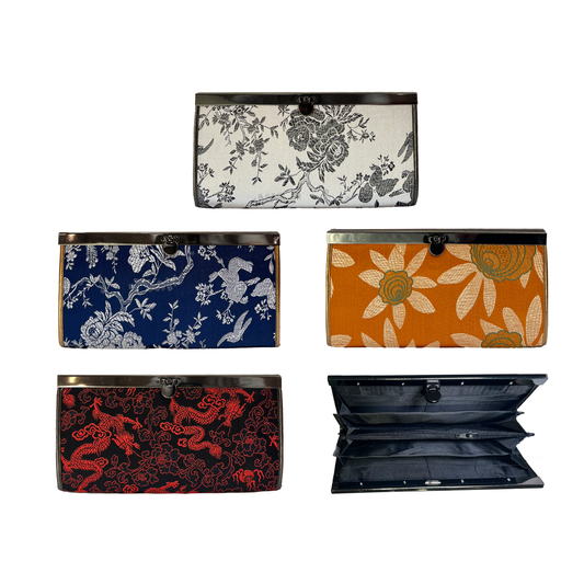 Set of five patterned wallets on a white background