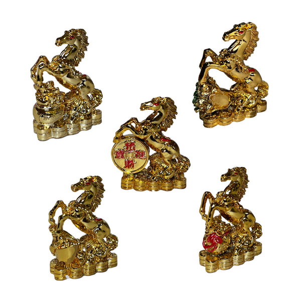 Set of five gold dragon figurines on a white background