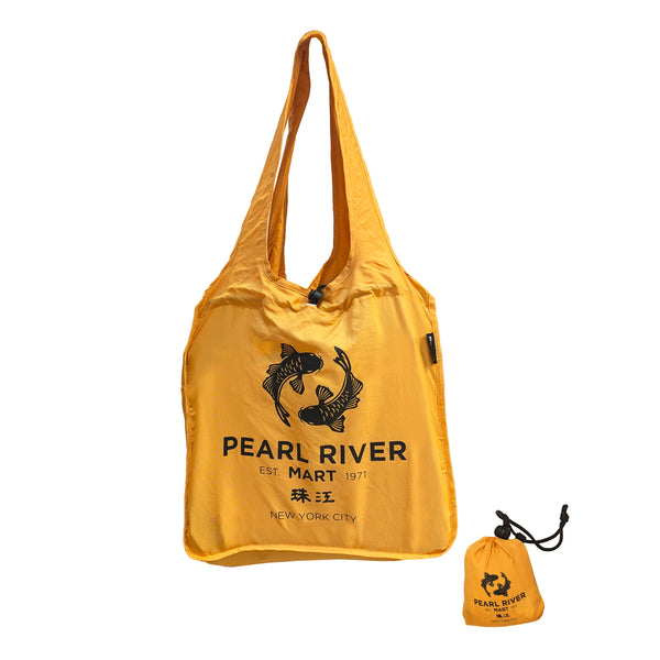 A yellow Pearl River Mart 'Eco' Bag with a printed logo, alongside its matching small pouch.