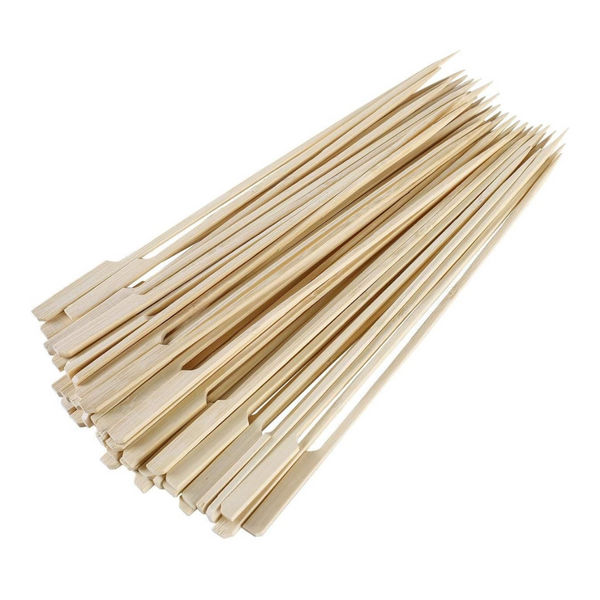 Bunch of wooden skewers on a white background
