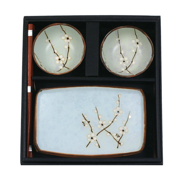 Ceramic dish set with floral design in a black box