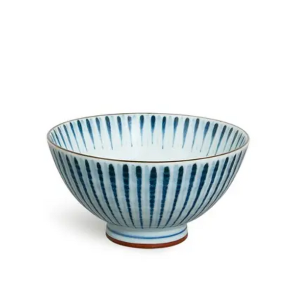 Ceramic bowl with blue vertical stripes on a white background