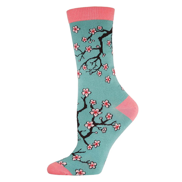 Teal sock with cherry blossom design and pink accents on a white background