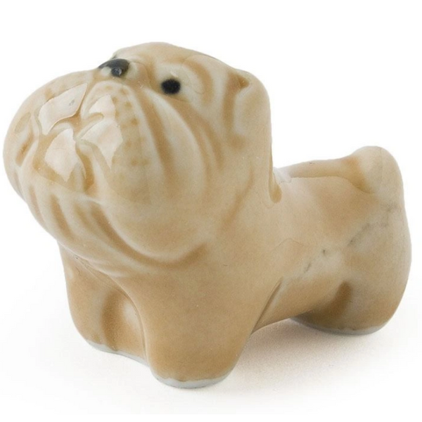 Cute brown bulldog as ceramic chopstick rest