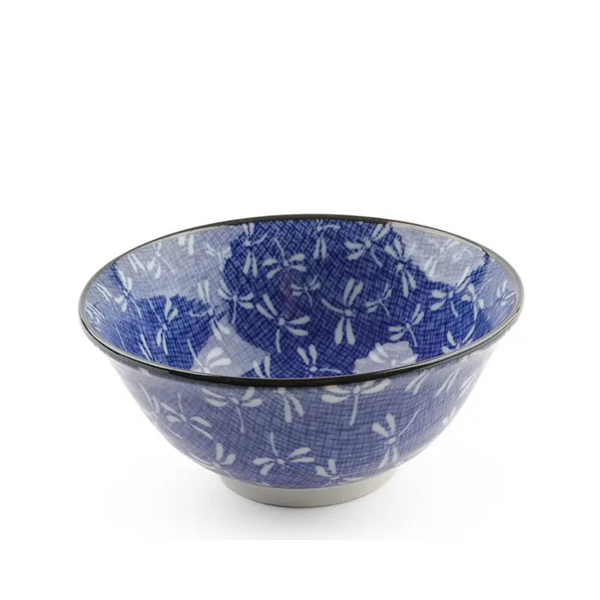 Blue and white dragonfly patterned bowl on a white background