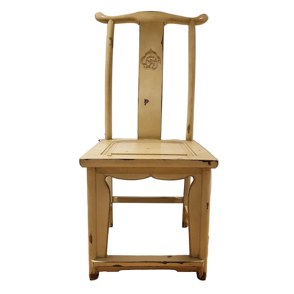 Wooden chair with a traditional design on a white background