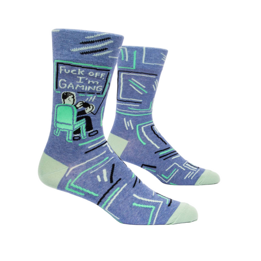 Blue socks with text and man playing video games