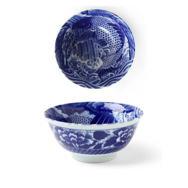 Blue and white ceramic bowls with intricate designs on a white background