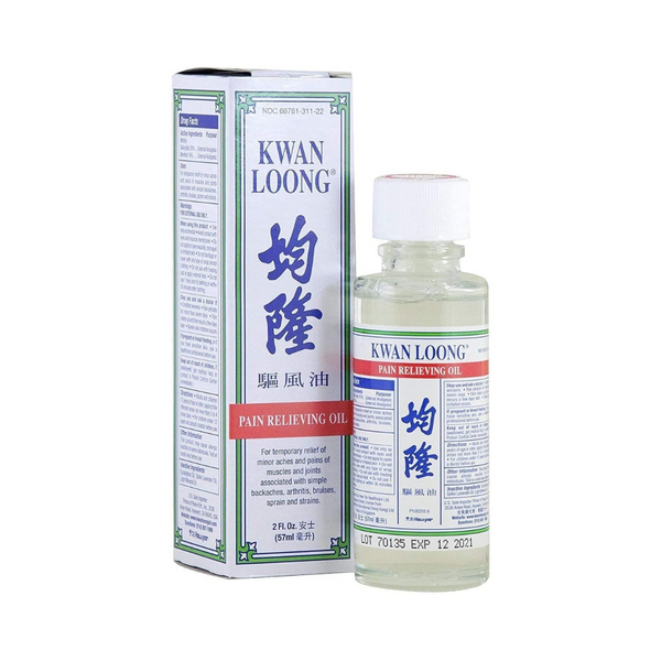 Kwan Loong pain relieving oil bottle and packaging on a white background