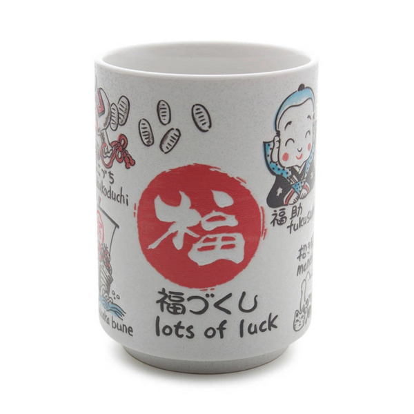 White mug with Japanese characters and illustrations on a white background