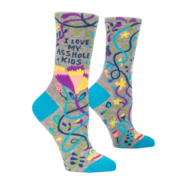 Colorful socks with text and patterns on a white background