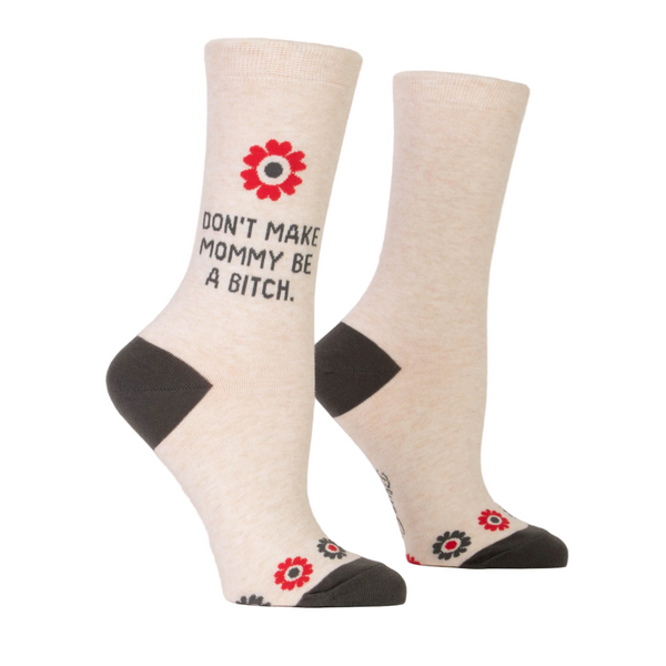 Light pink socks with text, red flower, and brown accents