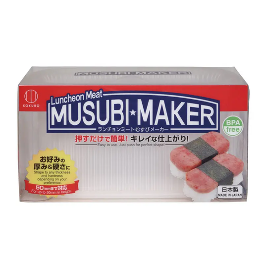 A boxed food product labeled 'Luncheon Meat MUSUBI MAKER' by Edurosu, shown on a plain white background. The package is mostly white with a red top band, blue central branding, Japanese text, a small 'BPA free' badge, and photos of sushi on the front.