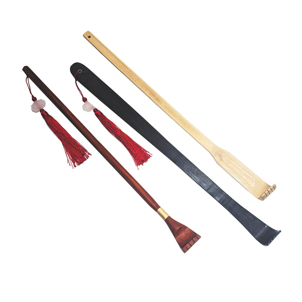 Three types of wooden back scratchers: red,black, bamboo