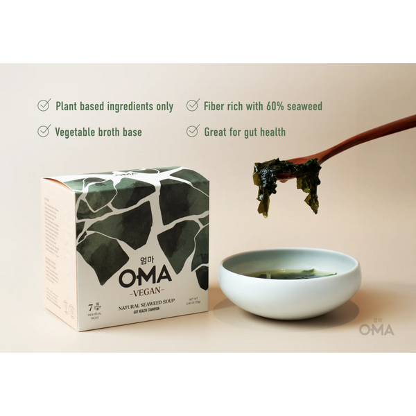 Box of OMA Vegan natural seaweed soup with a bowl of soup and seaweed on a beige background