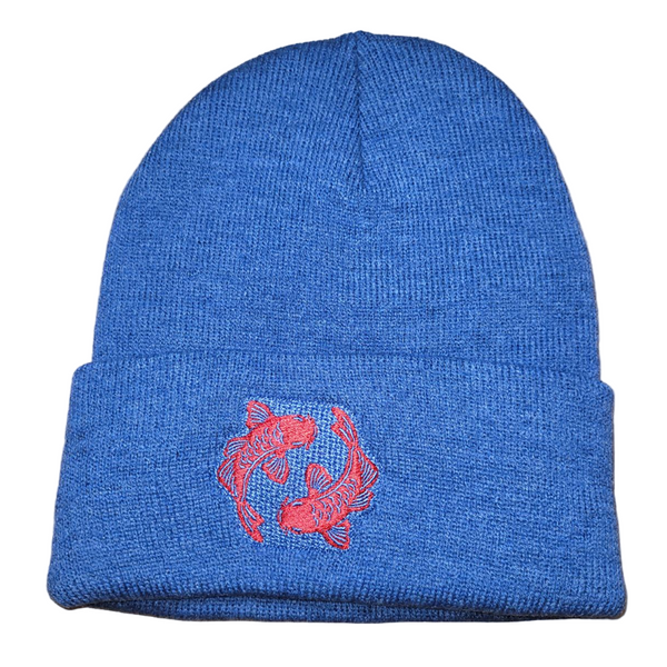 Blue beanie with a red fish emblem on a white background