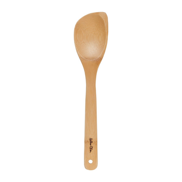 Wooden spoon with a plain background