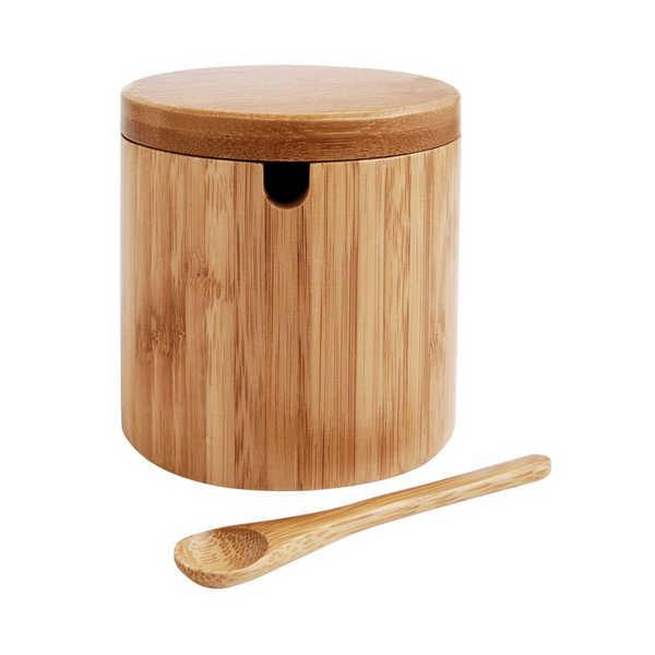 Wooden storage jar with a lid and a wooden spoon on a white background
