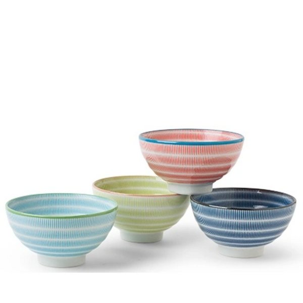 Set of four colorful striped ceramic bowls on a white background