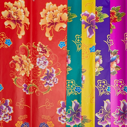 Five colorful paper sheets with floral patterns in red, green, yellow, purple, and pink.