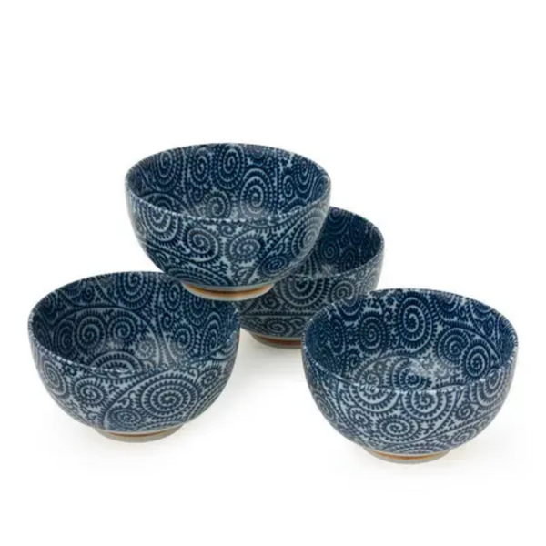 Set of four blue ceramic bowls with pattern on a white background