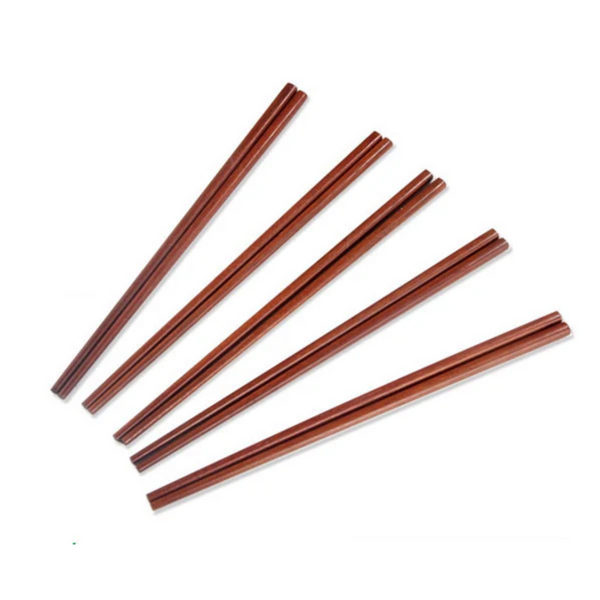 Set of red chopsticks on a white background