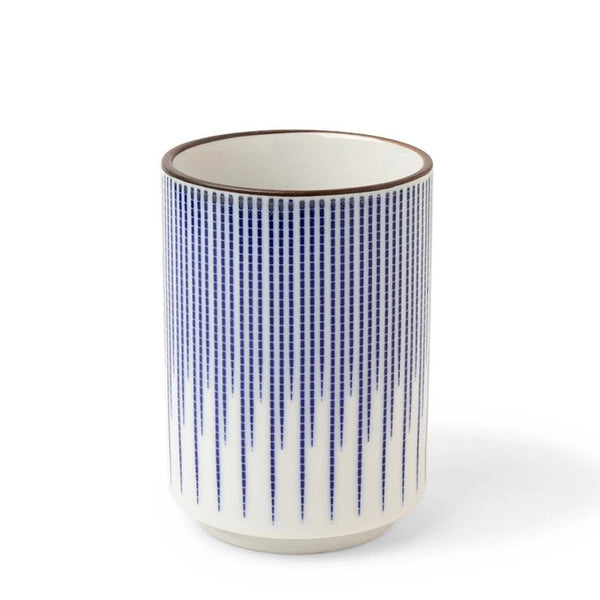 A ceramic bowl with a blue geometric pattern, viewed from the top