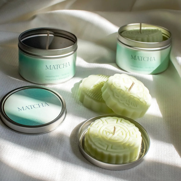Matcha mooncake-shaped candles with tins