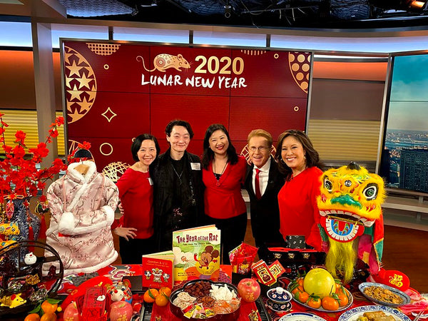 Joanne Kwong and Pearl River staff with CBS news anchor Cindy Hsu and memeteorologist John Elliot
