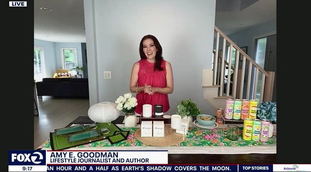 Journalist Amy Goodman with outdoor dining spread