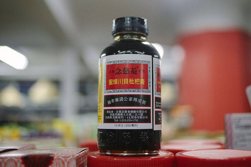 Bottle of Pei Pa Koa medicine