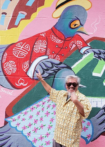 Activist Karlin Chan in front of mural, Mahjong Social