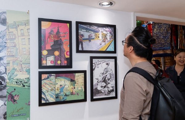 Visitor viewing the artwork in Pearl River Mart's Monkey King exhibition
