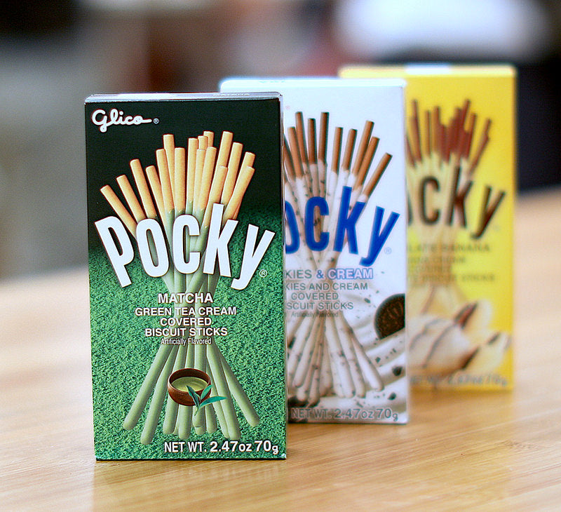 Three kinds of Pocky: matcha, cookies 'n cream, banana chocolate