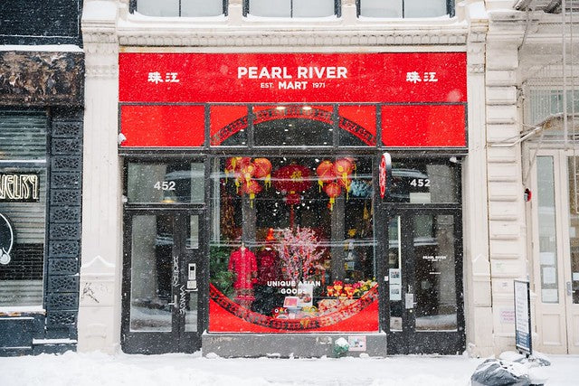 Exterior of Pearl River Mart in Soho on snowy day